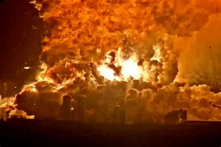 a container of nonstick cooking spray explodes when thrown into a fire.