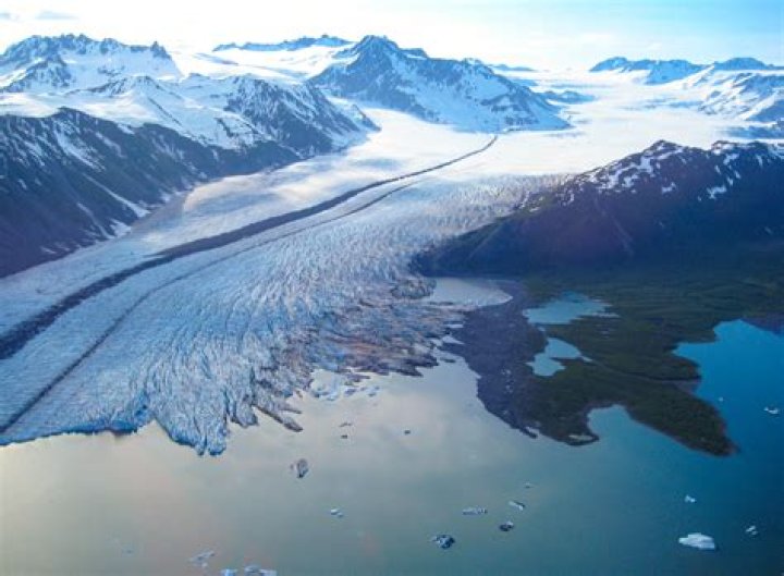 glaciers typically erode what type of valley?